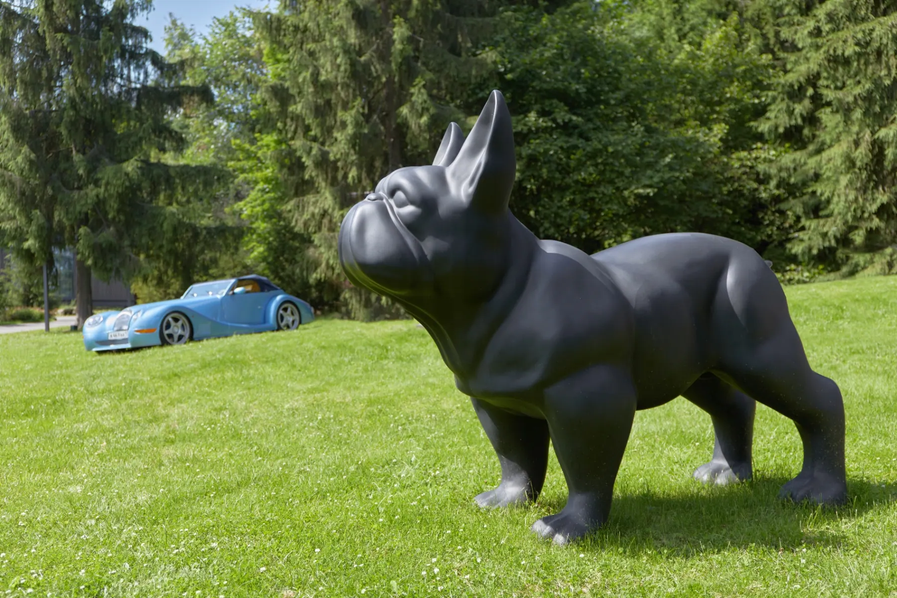 Sculpture on the lawn in the Berta Village gardens